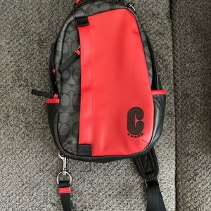 Black and red Coach crossbody with matching wallet, rarely used and like new!